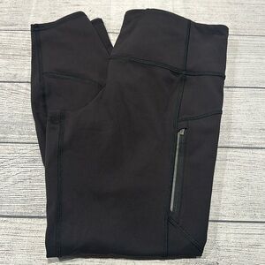 Women’s Athleta black Rainier Tight legging size L
